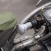 A gyári karburátort a Müce által készített kupak zárja; légáteresztése csavarással szabályozható